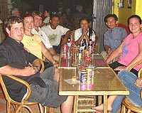 From left, Lee Gordon '06, Head, James Head '06, three Cambodian NGO staff, and Katie Head, James' sister.